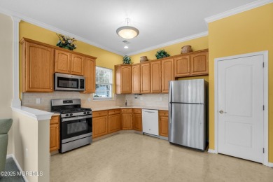 This Extended Elm with 4 Season Sunroom Sits On a Large Corner on Four Seasons Spa and Country Club in New Jersey - for sale on GolfHomes.com, golf home, golf lot