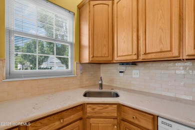 This Extended Elm with 4 Season Sunroom Sits On a Large Corner on Four Seasons Spa and Country Club in New Jersey - for sale on GolfHomes.com, golf home, golf lot