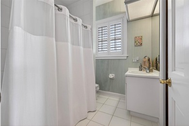 Experience timeless elegance in this meticulously maintained on Bayou Golf Club in Florida - for sale on GolfHomes.com, golf home, golf lot