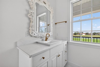 Experience timeless elegance in this meticulously maintained on Bayou Golf Club in Florida - for sale on GolfHomes.com, golf home, golf lot