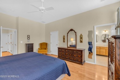This Extended Elm with 4 Season Sunroom Sits On a Large Corner on Four Seasons Spa and Country Club in New Jersey - for sale on GolfHomes.com, golf home, golf lot