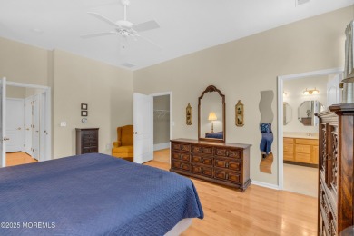 This Extended Elm with 4 Season Sunroom Sits On a Large Corner on Four Seasons Spa and Country Club in New Jersey - for sale on GolfHomes.com, golf home, golf lot
