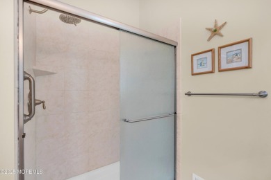 This Extended Elm with 4 Season Sunroom Sits On a Large Corner on Four Seasons Spa and Country Club in New Jersey - for sale on GolfHomes.com, golf home, golf lot