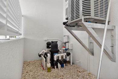 Experience timeless elegance in this meticulously maintained on Bayou Golf Club in Florida - for sale on GolfHomes.com, golf home, golf lot