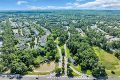 This Extended Elm with 4 Season Sunroom Sits On a Large Corner on Four Seasons Spa and Country Club in New Jersey - for sale on GolfHomes.com, golf home, golf lot
