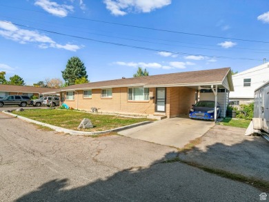 Three Side by Side brick duplexes, totaling 6 units on .50 acres on Nibley Park Golf Course in Utah - for sale on GolfHomes.com, golf home, golf lot