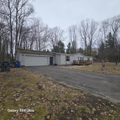 Charming 3 bedrooms 2 full bath home on large corner lot. 2x6 on Burning Oak Country Club in Michigan - for sale on GolfHomes.com, golf home, golf lot