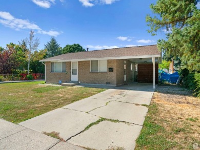 Three Side by Side brick duplexes, totaling 6 units on .50 acres on Nibley Park Golf Course in Utah - for sale on GolfHomes.com, golf home, golf lot