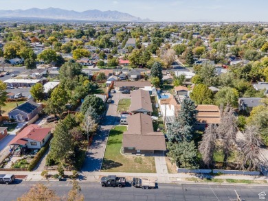 Three Side by Side brick duplexes, totaling 6 units on .50 acres on Nibley Park Golf Course in Utah - for sale on GolfHomes.com, golf home, golf lot