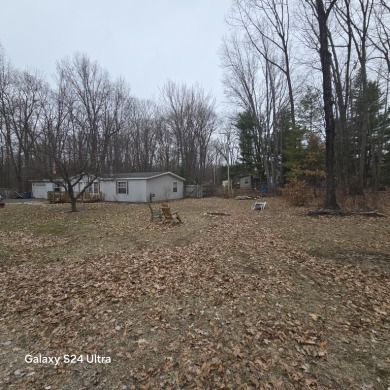 Charming 3 bedrooms 2 full bath home on large corner lot. 2x6 on Burning Oak Country Club in Michigan - for sale on GolfHomes.com, golf home, golf lot