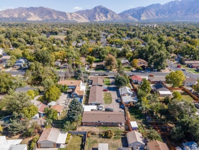 Three Side by Side brick duplexes, totaling 6 units on .50 acres on Nibley Park Golf Course in Utah - for sale on GolfHomes.com, golf home, golf lot