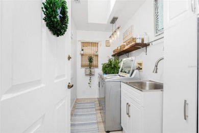 Stunning and tastefully updated home seated on an oversized lot on Rotonda Golf and Country Club - Long Marsh  in Florida - for sale on GolfHomes.com, golf home, golf lot