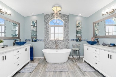 Stunning and tastefully updated home seated on an oversized lot on Rotonda Golf and Country Club - Long Marsh  in Florida - for sale on GolfHomes.com, golf home, golf lot