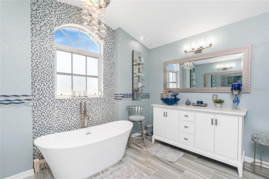Stunning and tastefully updated home seated on an oversized lot on Rotonda Golf and Country Club - Long Marsh  in Florida - for sale on GolfHomes.com, golf home, golf lot