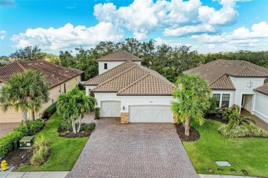 Welcome to 13902 Messina Loop in Esplanade. Relax in the pool on Esplanade Golf and Country at Lakewood Ranch in Florida - for sale on GolfHomes.com, golf home, golf lot