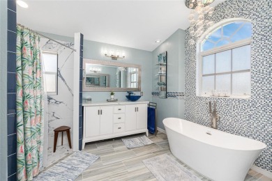 Stunning and tastefully updated home seated on an oversized lot on Rotonda Golf and Country Club - Long Marsh  in Florida - for sale on GolfHomes.com, golf home, golf lot