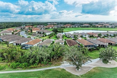 Welcome to 13902 Messina Loop in Esplanade. Relax in the pool on Esplanade Golf and Country at Lakewood Ranch in Florida - for sale on GolfHomes.com, golf home, golf lot