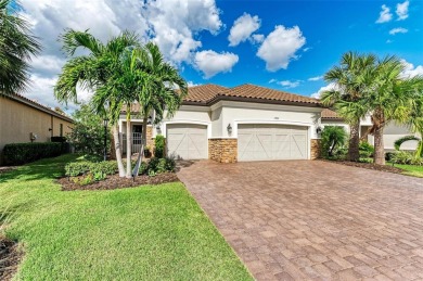 Welcome to 13902 Messina Loop in Esplanade. Relax in the pool on Esplanade Golf and Country at Lakewood Ranch in Florida - for sale on GolfHomes.com, golf home, golf lot