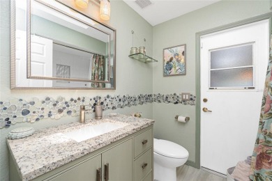 Stunning and tastefully updated home seated on an oversized lot on Rotonda Golf and Country Club - Long Marsh  in Florida - for sale on GolfHomes.com, golf home, golf lot