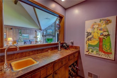 Sip coffee from your EXPANSIVE BACK PORCH overlooking one of on Blue Hills Country Club in Missouri - for sale on GolfHomes.com, golf home, golf lot