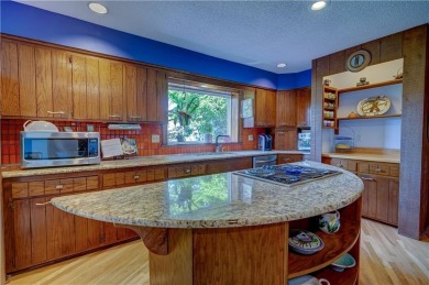 Sip coffee from your EXPANSIVE BACK PORCH overlooking one of on Blue Hills Country Club in Missouri - for sale on GolfHomes.com, golf home, golf lot