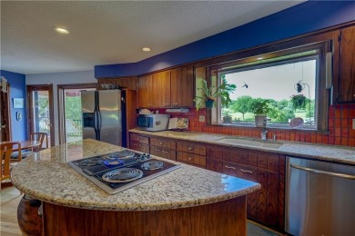 Sip coffee from your EXPANSIVE BACK PORCH overlooking one of on Blue Hills Country Club in Missouri - for sale on GolfHomes.com, golf home, golf lot