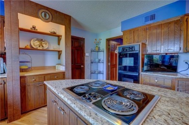 Sip coffee from your EXPANSIVE BACK PORCH overlooking one of on Blue Hills Country Club in Missouri - for sale on GolfHomes.com, golf home, golf lot