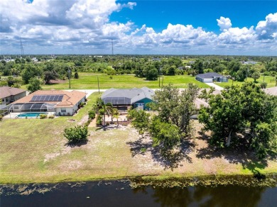 Stunning and tastefully updated home seated on an oversized lot on Rotonda Golf and Country Club - Long Marsh  in Florida - for sale on GolfHomes.com, golf home, golf lot