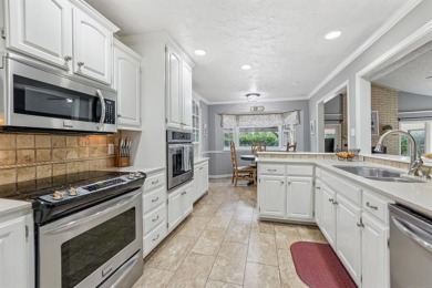 Spacious Golf Course Living with Poolside Charm. Nestled along on Indian Springs Country Club in Oklahoma - for sale on GolfHomes.com, golf home, golf lot
