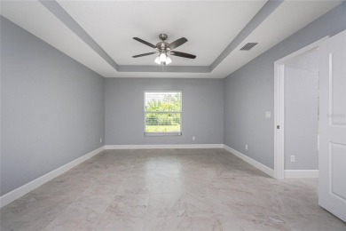 THIS *BETTER THAN NEW HOME* has been meticulously maintained and on Rotonda Golf and Country Club - Long Marsh  in Florida - for sale on GolfHomes.com, golf home, golf lot