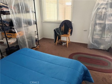 This property has lots of potential at a great price with an on Leisure World Seal Beach Golf Course in California - for sale on GolfHomes.com, golf home, golf lot