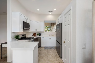 Welcome to effortless desert living in the highly sought-after on Heritage Palms Golf Club in California - for sale on GolfHomes.com, golf home, golf lot