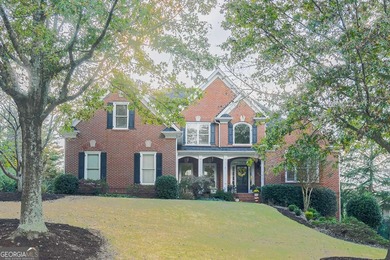 Experience refined living at 1041 Windermere Crossing an elegant on Windermere Golf Club in Georgia - for sale on GolfHomes.com, golf home, golf lot