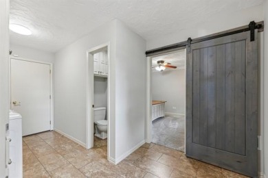 Spacious Golf Course Living with Poolside Charm. Nestled along on Indian Springs Country Club in Oklahoma - for sale on GolfHomes.com, golf home, golf lot