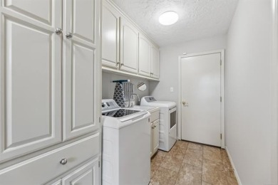 Spacious Golf Course Living with Poolside Charm. Nestled along on Indian Springs Country Club in Oklahoma - for sale on GolfHomes.com, golf home, golf lot