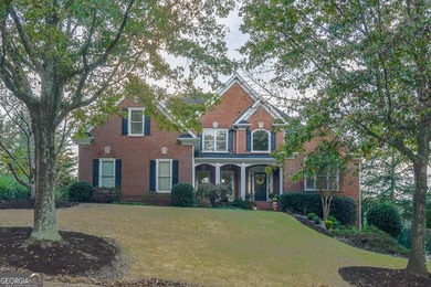 Experience refined living at 1041 Windermere Crossing an elegant on Windermere Golf Club in Georgia - for sale on GolfHomes.com, golf home, golf lot