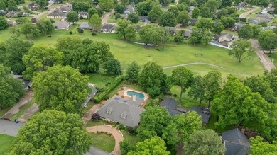 Spacious Golf Course Living with Poolside Charm. Nestled along on Indian Springs Country Club in Oklahoma - for sale on GolfHomes.com, golf home, golf lot