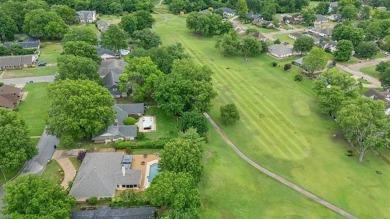 Spacious Golf Course Living with Poolside Charm. Nestled along on Indian Springs Country Club in Oklahoma - for sale on GolfHomes.com, golf home, golf lot