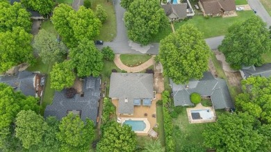 Spacious Golf Course Living with Poolside Charm. Nestled along on Indian Springs Country Club in Oklahoma - for sale on GolfHomes.com, golf home, golf lot