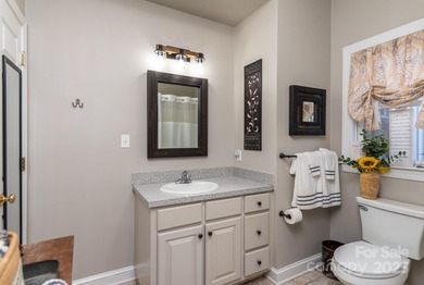 Envision your family gathering in this cozy custom-built cottage on High Meadows Golf and Country Club in North Carolina - for sale on GolfHomes.com, golf home, golf lot