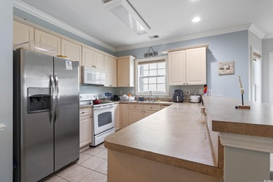 Step into this beautifully updated 3 bedroom, 2 bathroom condo on Myrtlewood Golf Course and Club  in South Carolina - for sale on GolfHomes.com, golf home, golf lot