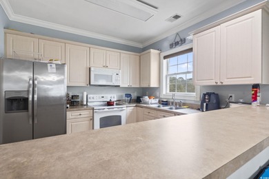 Step into this beautifully updated 3 bedroom, 2 bathroom condo on Myrtlewood Golf Course and Club  in South Carolina - for sale on GolfHomes.com, golf home, golf lot