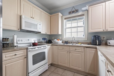 Step into this beautifully updated 3 bedroom, 2 bathroom condo on Myrtlewood Golf Course and Club  in South Carolina - for sale on GolfHomes.com, golf home, golf lot