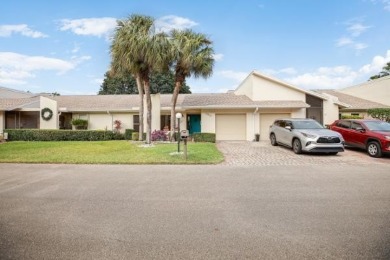 NEW LOWER PRICE. NEW PHOTOS. 2 bedroom/2 bath Villa with huge on Poinciana Golf Club in Florida - for sale on GolfHomes.com, golf home, golf lot