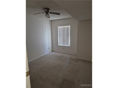 Easy access downstairs condo with patio view of pool and spa on Chaparral Golf and Country Club in Arizona - for sale on GolfHomes.com, golf home, golf lot