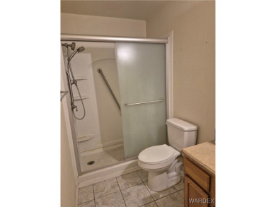 Easy access downstairs condo with patio view of pool and spa on Chaparral Golf and Country Club in Arizona - for sale on GolfHomes.com, golf home, golf lot