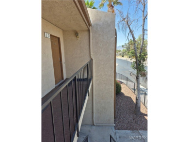 PRIME UPSTAIRS CORNER VIEW CONDO WITH BEST PATIO VIEWS OF GOLF on Chaparral Golf and Country Club in Arizona - for sale on GolfHomes.com, golf home, golf lot
