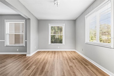 BRAND NEW FLOORING! This home boasts high-end upgrades on Heritage Isles Golf and Country Club in Florida - for sale on GolfHomes.com, golf home, golf lot