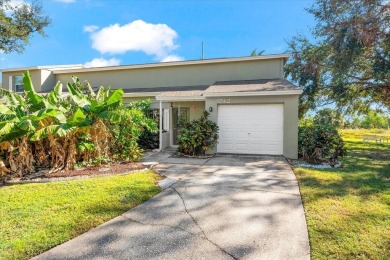 Come see this 2 bedroom 1.5 bathrooms, 1 car garage, END UNIT on East Bay Golf Club in Florida - for sale on GolfHomes.com, golf home, golf lot