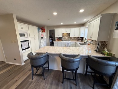 Nestled at the Country Club in Fort Dodge, this beautifully on Fort Dodge Country Club in Iowa - for sale on GolfHomes.com, golf home, golf lot